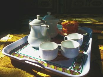 Coffee cup and coffee cup on table