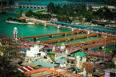 High angle view of bridges and buildings in city 