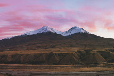 Scenic view of mountains against sky during sunset