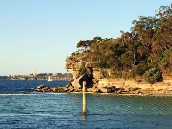 Scenic view of sea against clear sky