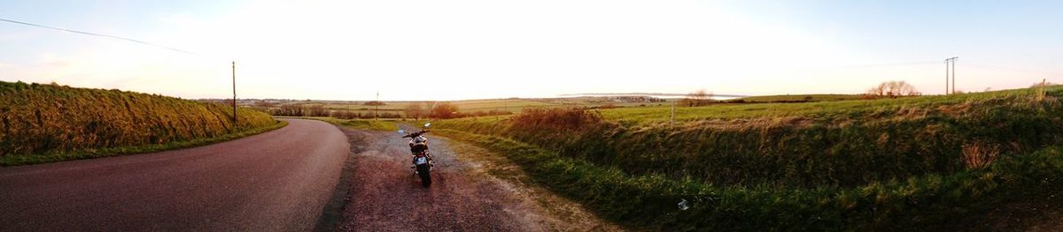 Motor cycle parked at roadside