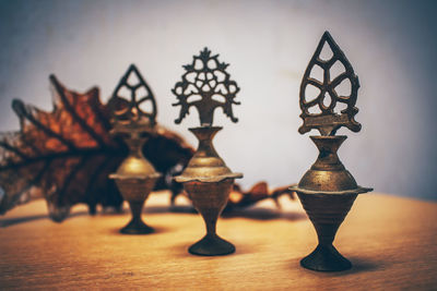 Close-up of illuminated lamp on table at home