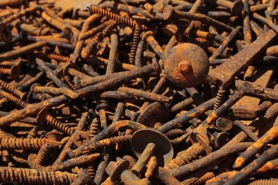 Full frame shot of rusty screws