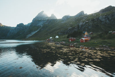 Scenic view of lake and mountains against sky