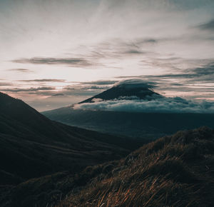 Scenic view of landscape against sky during sunset