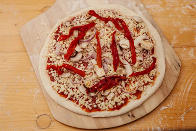 High angle view of pizza on table