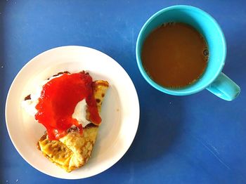 Close-up of breakfast served on table