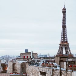 Buildings in city against sky