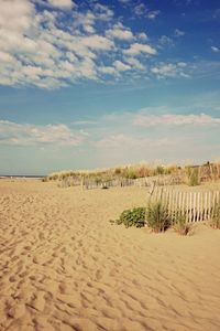 Scenic view of beach against sky