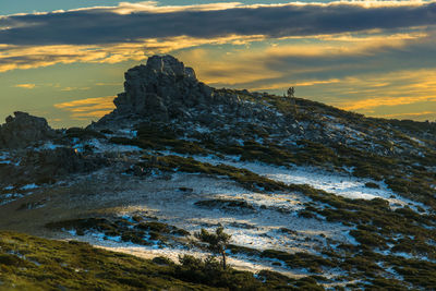 Scenic view of mountain against sky during sunset