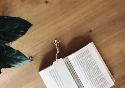 High angle view of open book on table