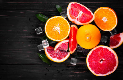 High angle view of orange fruits on table