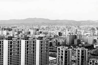 Cityscape with buildings in background