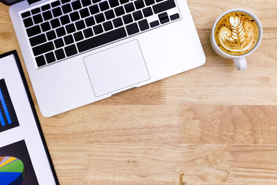 High angle view of coffee cup on table