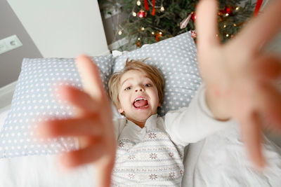 Portrait of young woman using digital tablet