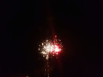 Firework display at night