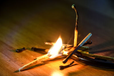 Close-up of fire on table