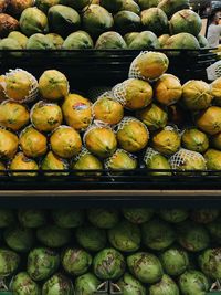 Stack of fruits for sale at market stall