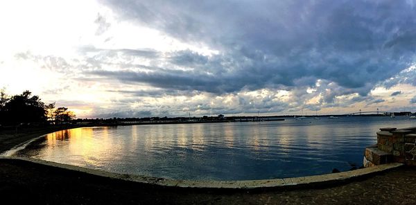 Scenic view of lake against sky during sunset