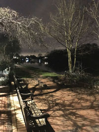 Scenic view of lake against sky at night