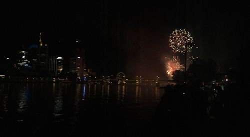 Firework display at night