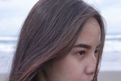 Close-up of woman at beach