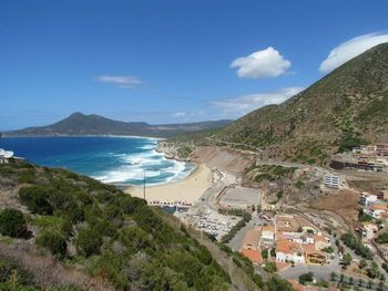 Scenic view of sea against blue sky