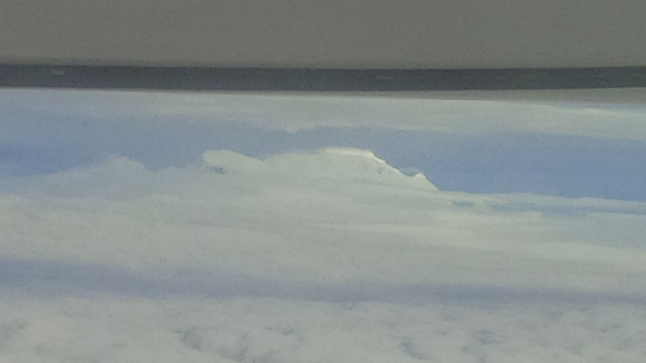 SCENIC VIEW OF CLOUDS OVER SEA