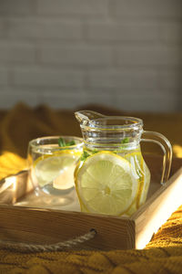 Close-up of drink on wooden tray