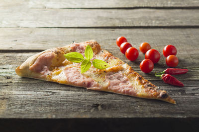 Close-up of pizza on cutting board