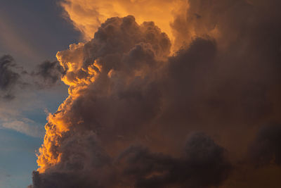 Low angle view of dramatic sky during sunset