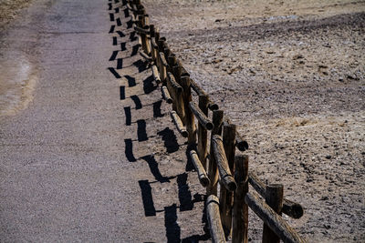 High angle view of bicycles on footpath