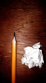 High angle view of ice cream on wooden table