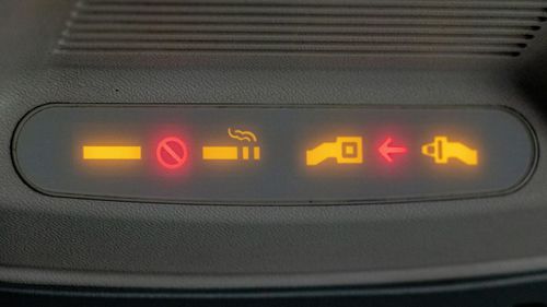 Close-up of text on airplane window