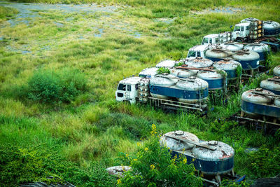 High angle view of abandoned trucks on land