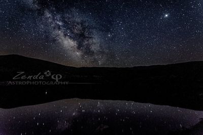 Scenic view of star field against sky at night