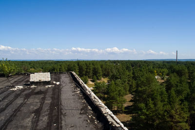 Scenic view of landscape against blue sky