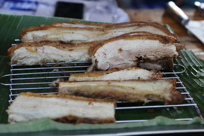 High angle view of meat on barbecue grill