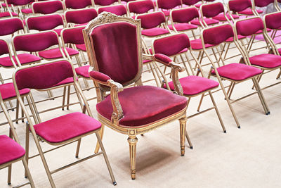 High angle view of chairs on table