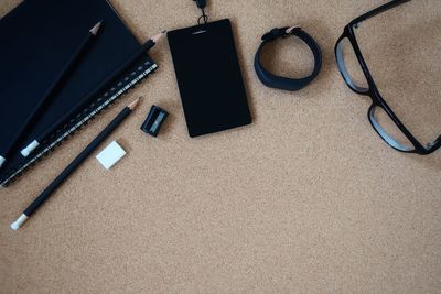 High angle view of various objects on table