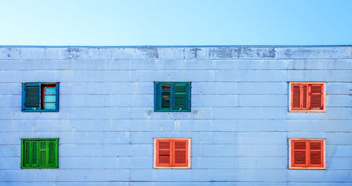 Blue building against sky