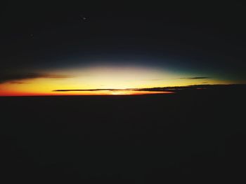 Scenic view of silhouette landscape against sky during sunset