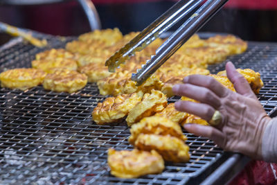 Close-up of person preparing food