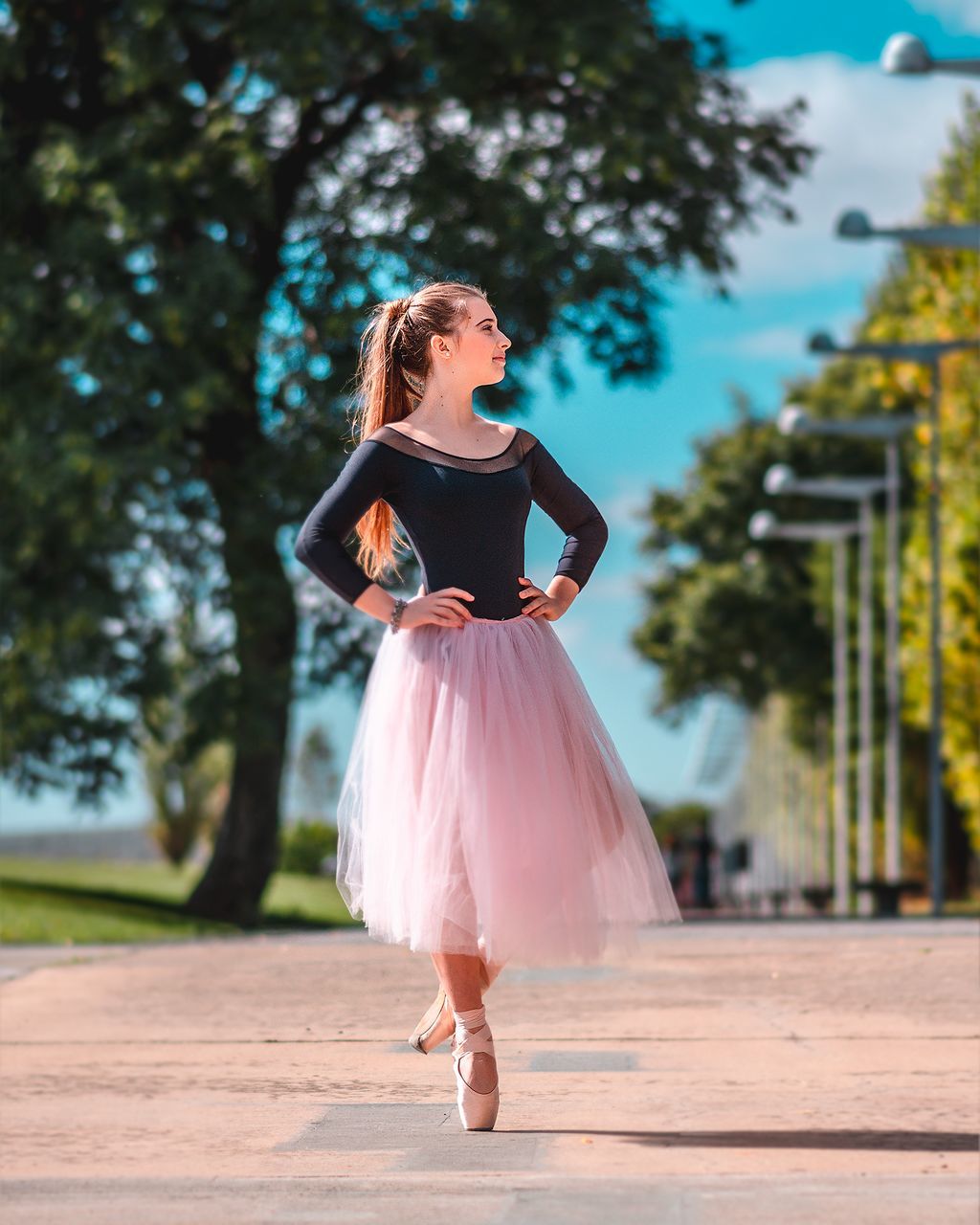 full length, one person, fashion, women, real people, lifestyles, young adult, young women, clothing, leisure activity, dress, tree, beautiful woman, focus on foreground, beauty, day, hair, nature, hairstyle, outdoors