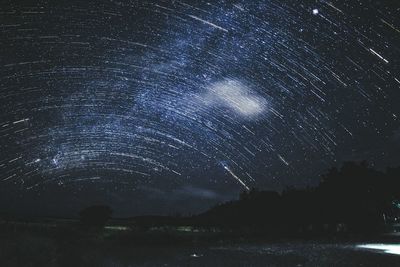 Fireworks against sky at night