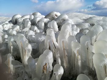 Close-up of snow against sky