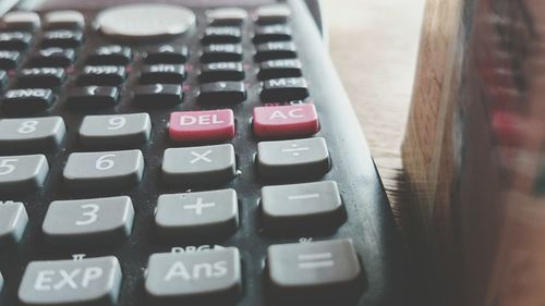Close-up of calculator on table