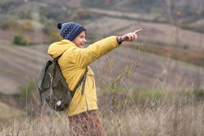 Girl standing on field
