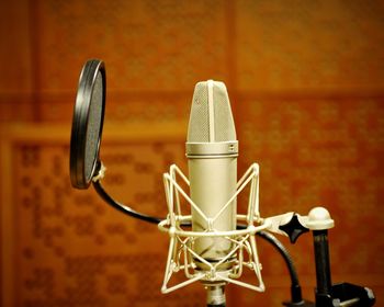 Close-up of microphone on stand at recording studio