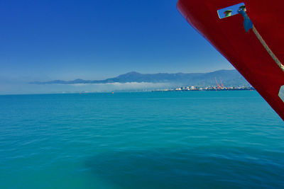 Scenic view of sea against blue sky